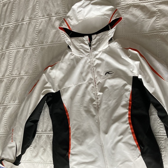 Kjus women’s ski jacket. Gorgeous, classic white with black & orange detailing. - Picture 9 of 9
